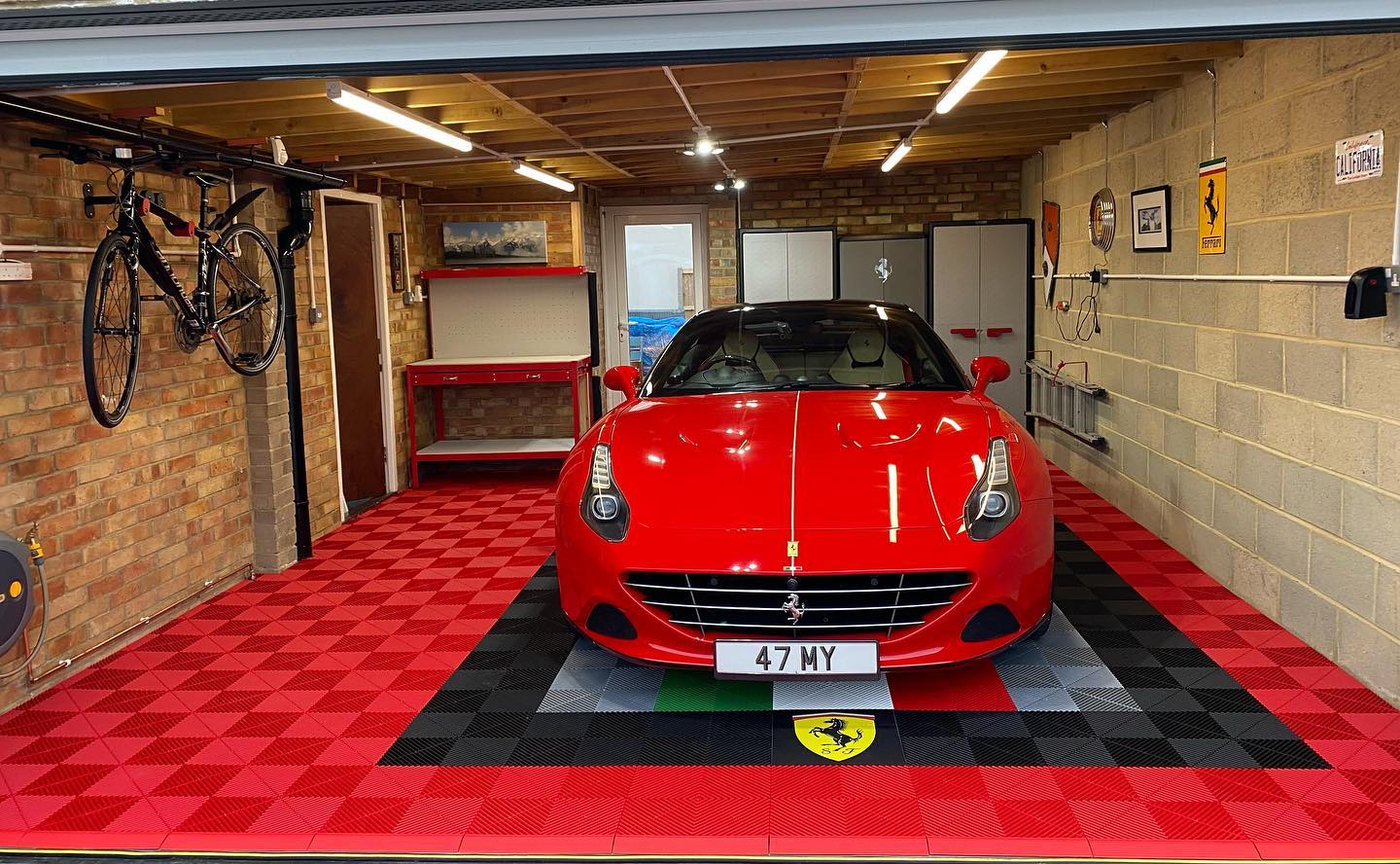Ferrari super car in high end garage that has swisstrax installed