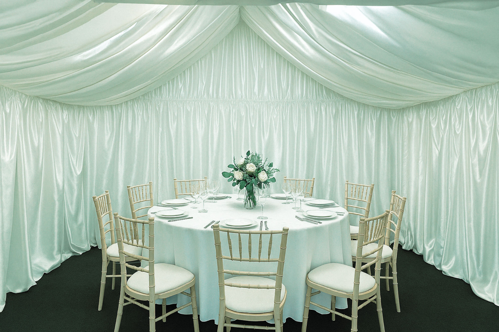 Elegant marquee lining around a dining setting