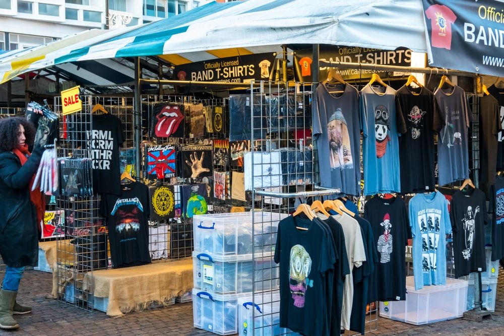 band t-shirts on a market stall