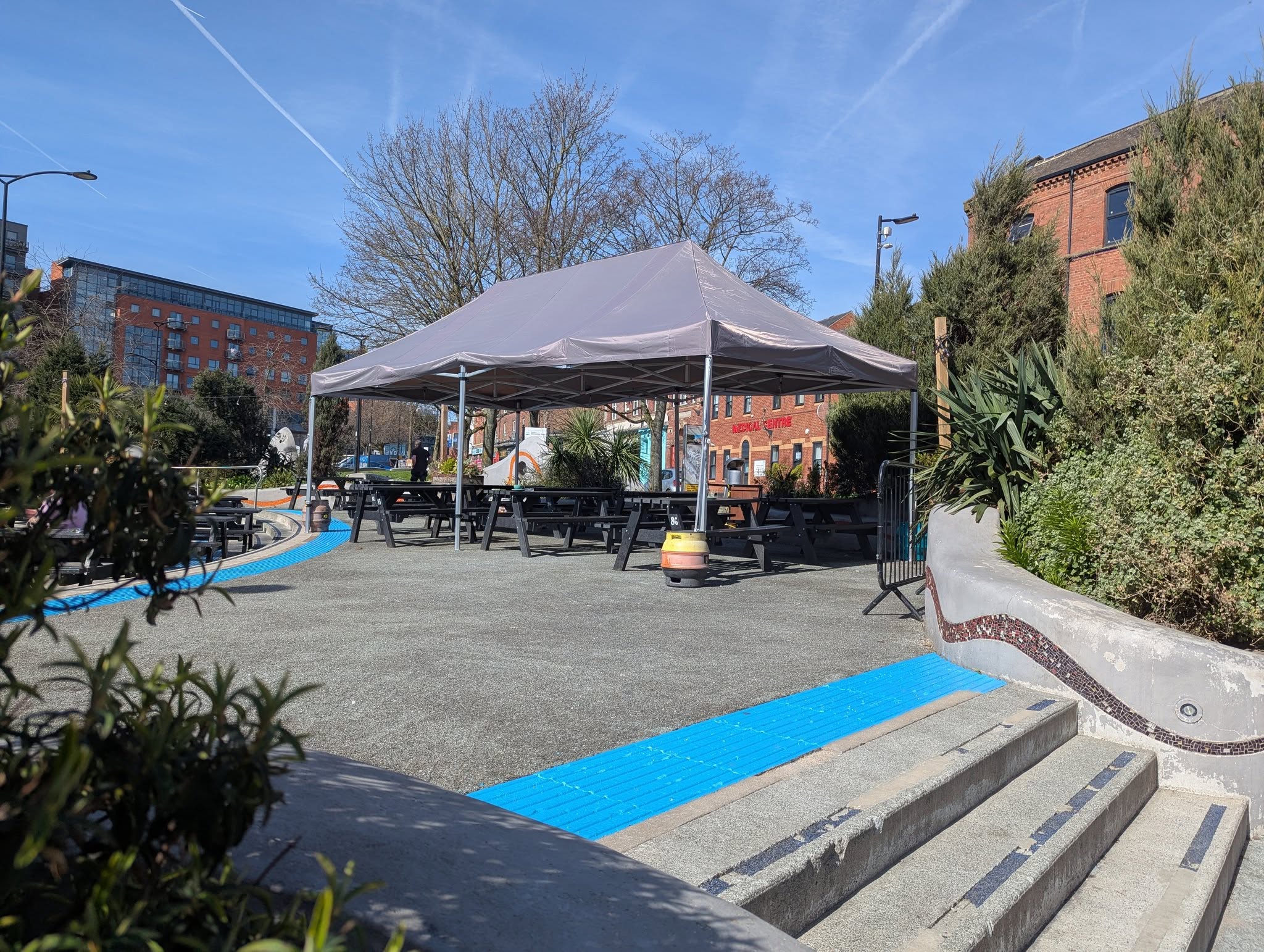branded gazebos cover a changing area for a netball team
