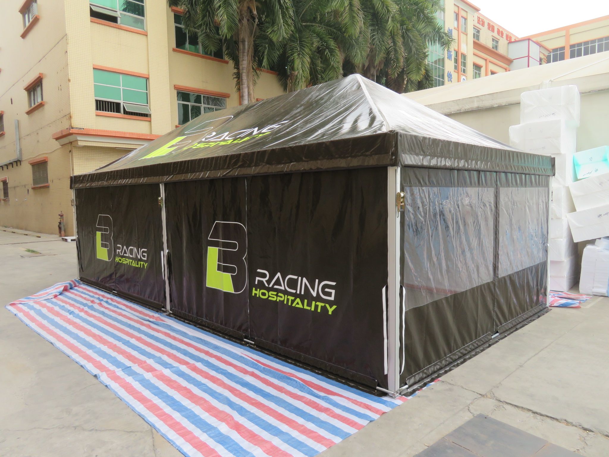 a black branded motorsport tent