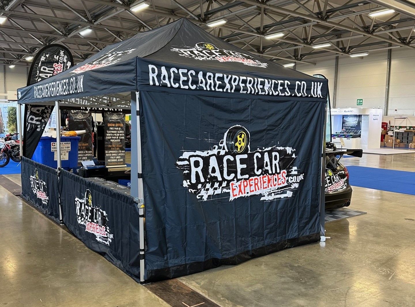 a branded gazebo at a trade exhibition