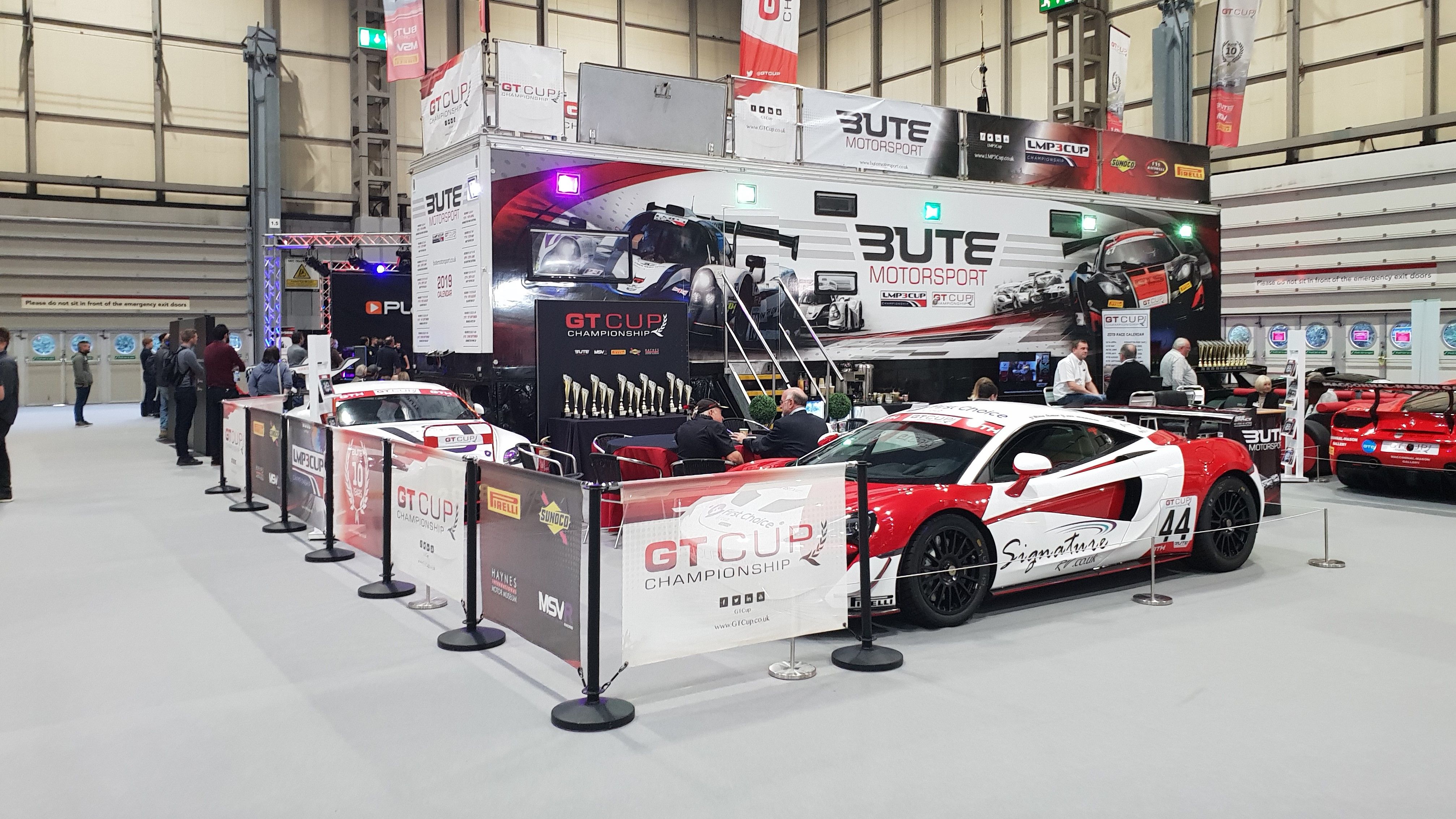 cafe barriers at motorsport exhibition