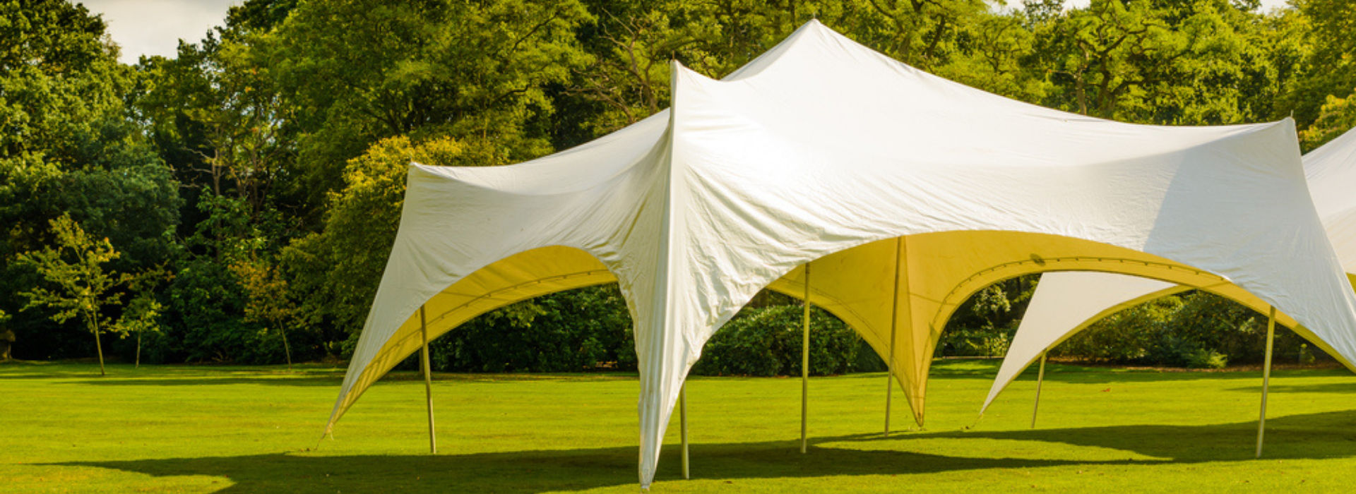 capri marquee in a sunny field