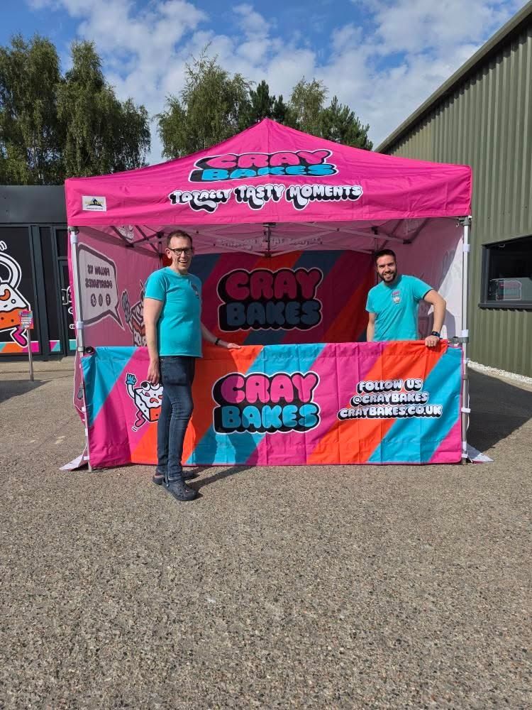Bright pink Craybakes gazebo with distinct branding