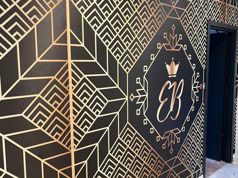 Custom printed wallpaper applied to a commercial interior wall