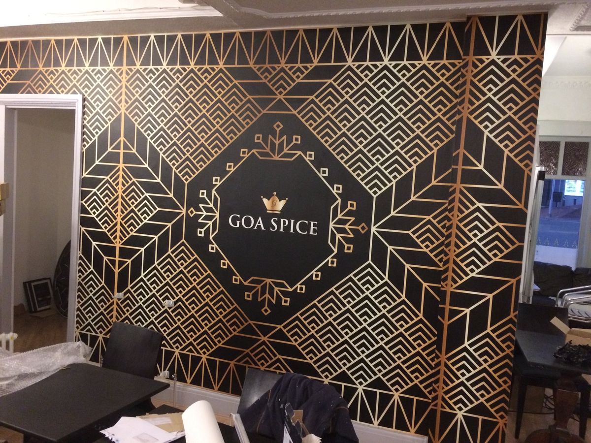 Custom printed wallpaper feature wall in a restaurant interior