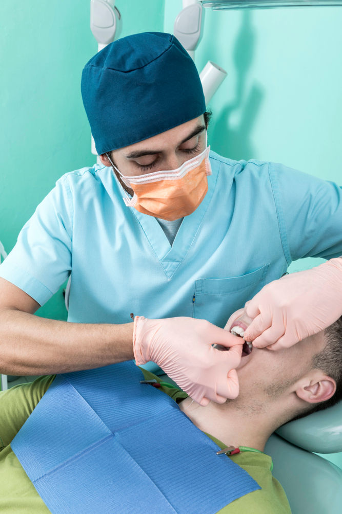 dentist works on a patient