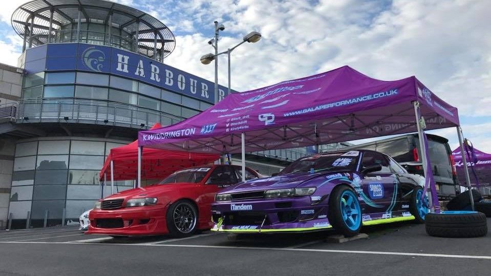 Purple Silvia S15 beneath a purple gazebo canopy