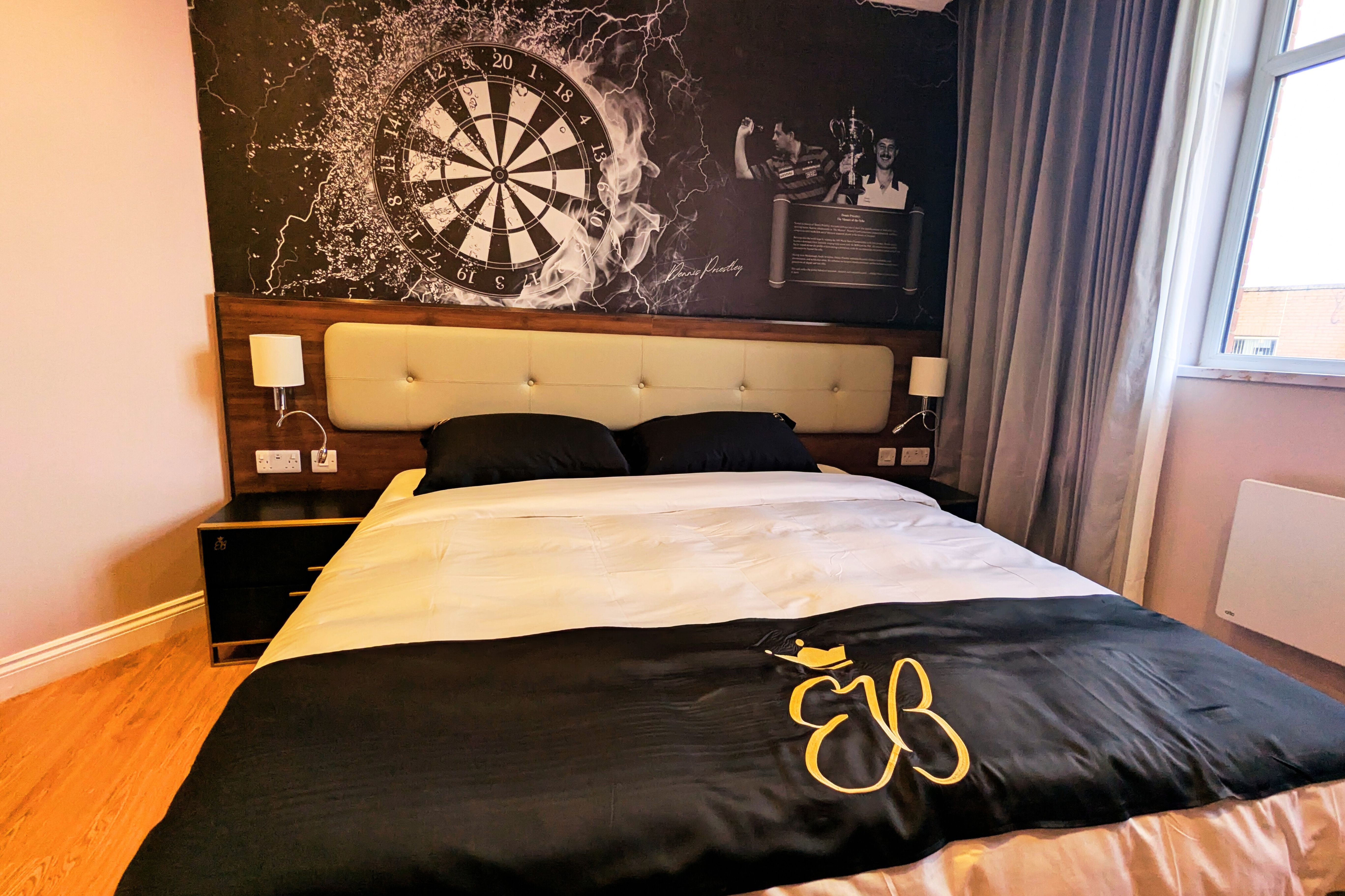 Dennis Priestley Room Empress Suites Hotel