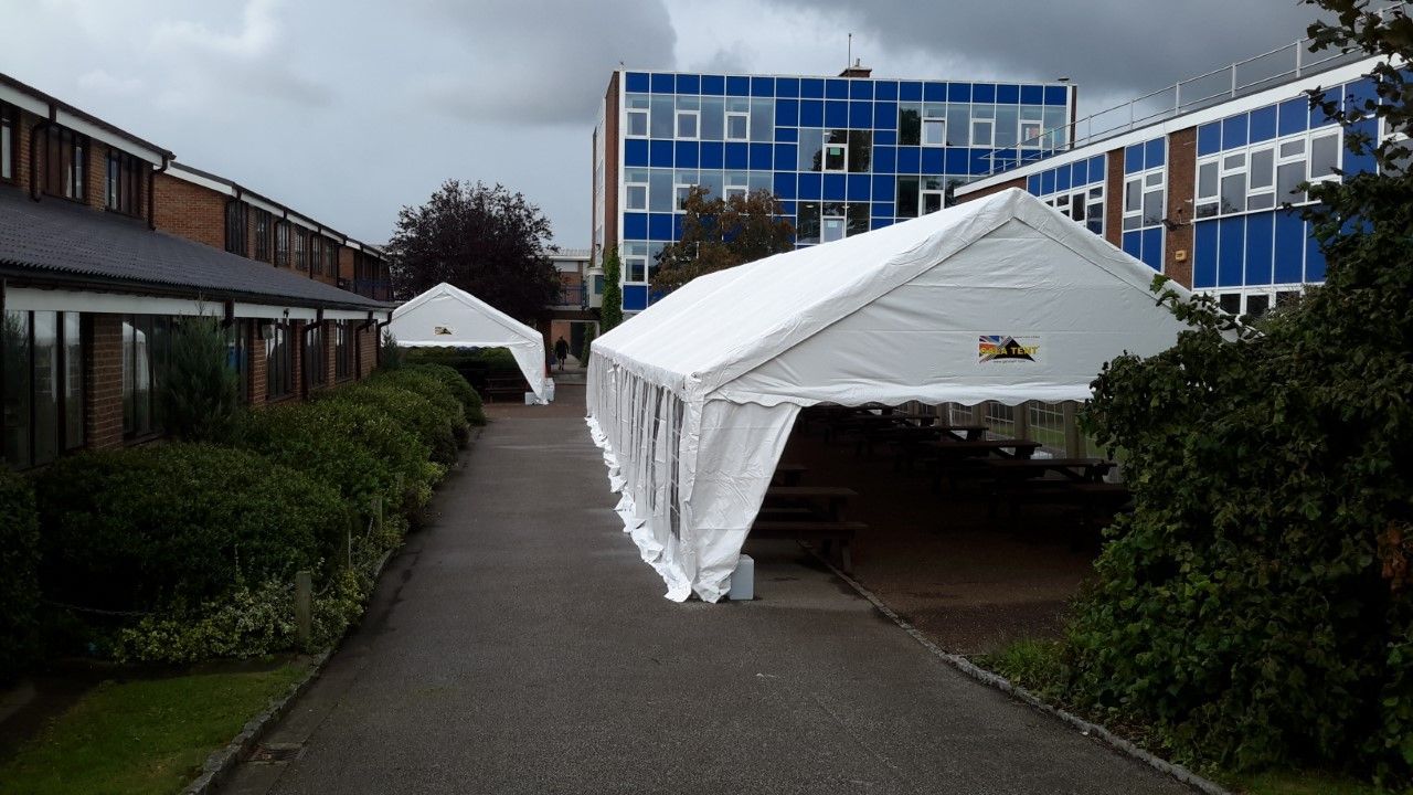 a large marquee outside a school