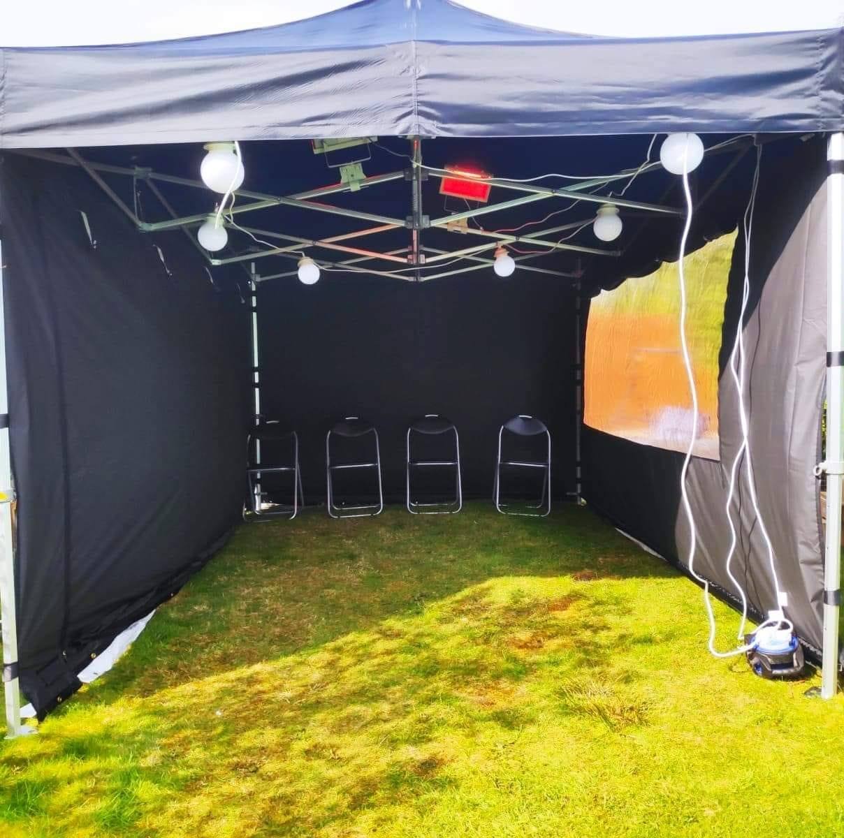 LED globe lighting hanging from a party gazebo