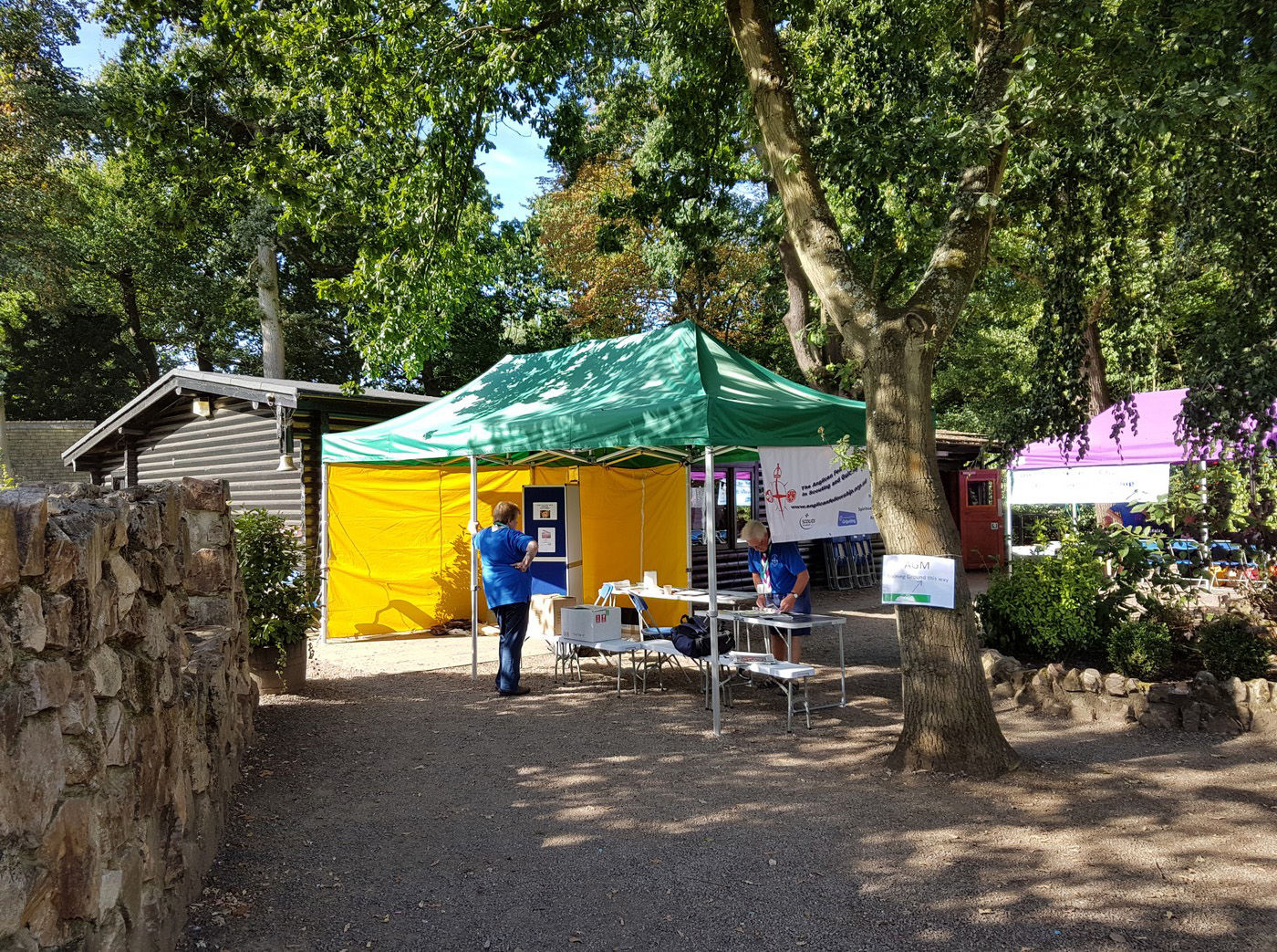 green gazebo at a scouting jamporeee in the sunshine