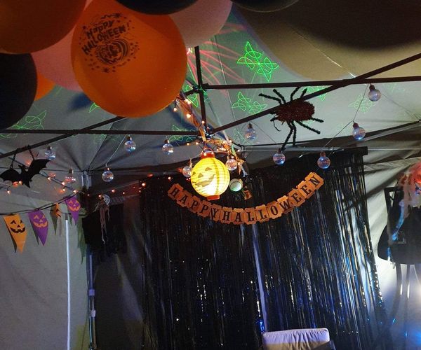 Pop-up gazebo transformed into a Halloween attraction