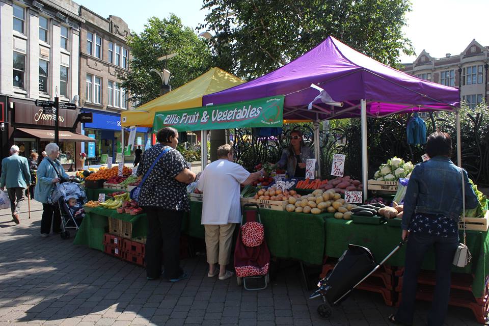 yellow and purple market stall gazebos for fruit sellers
