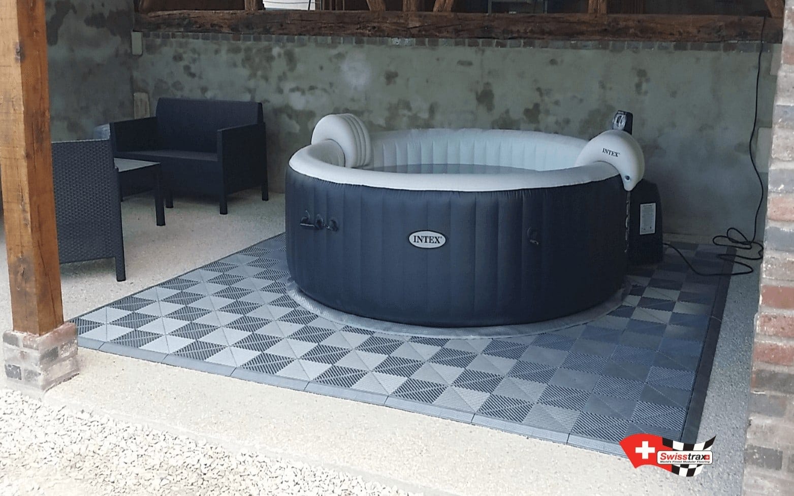 Swisstrax flooring beneath a hot tub