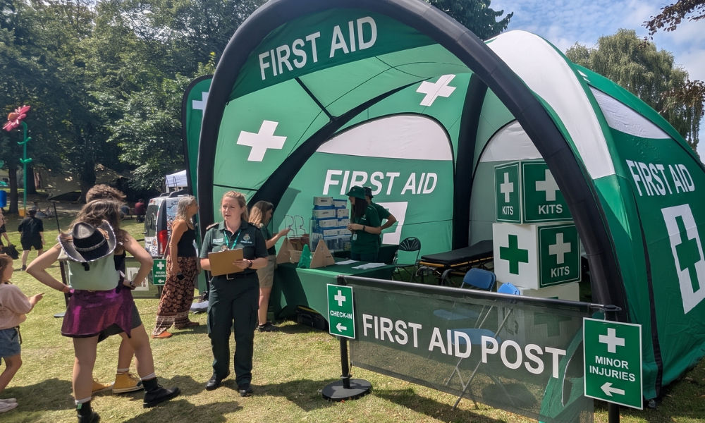 medical team under a green inflatable dome tent