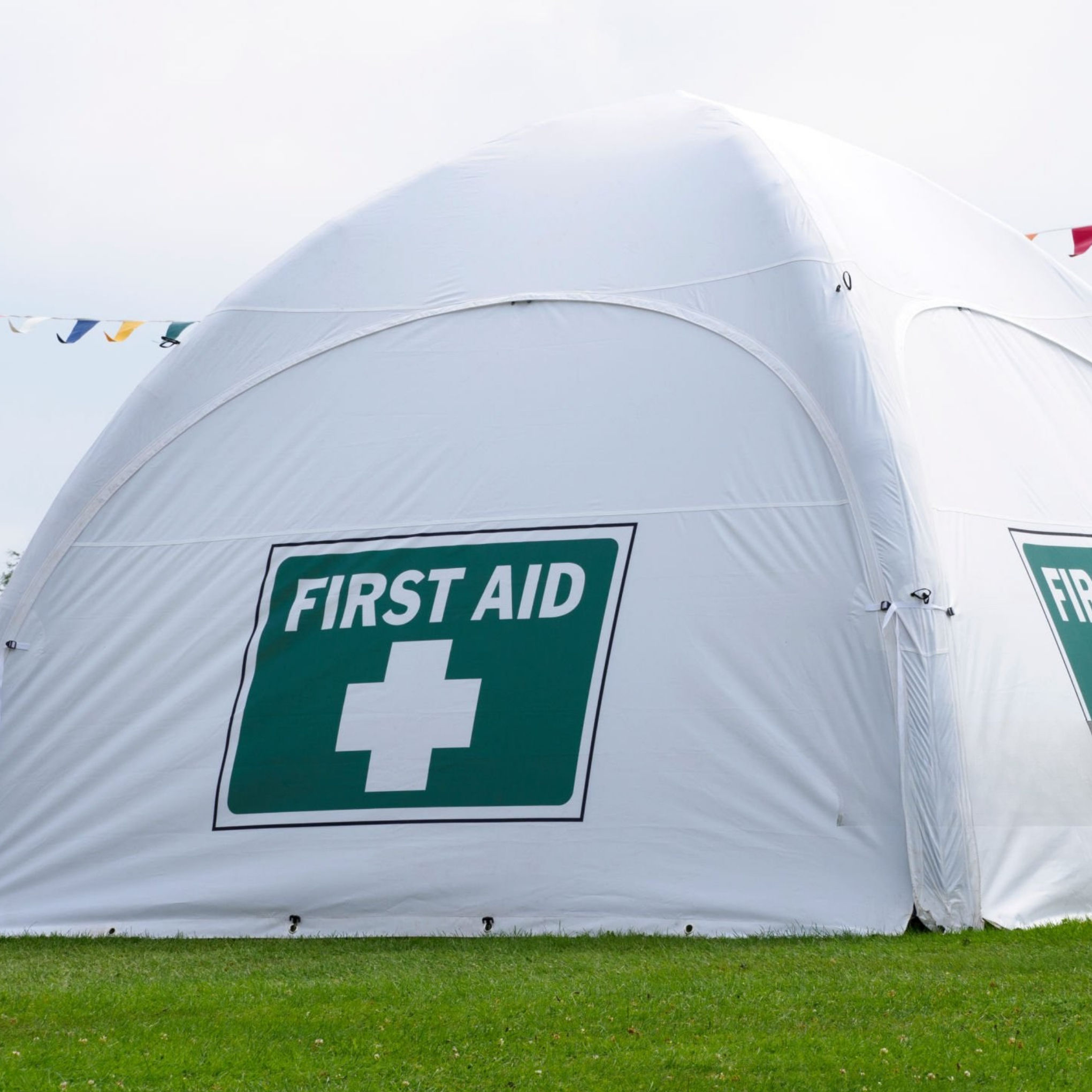 A white inflatable first aid tent