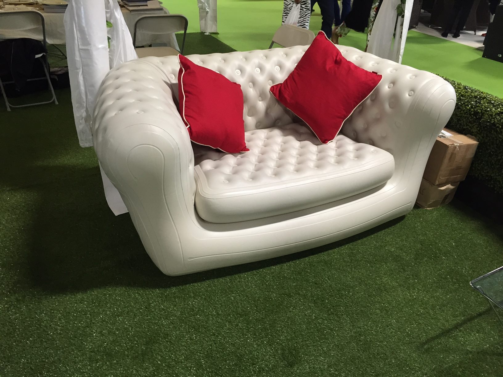 inflatable sofa with red cushions