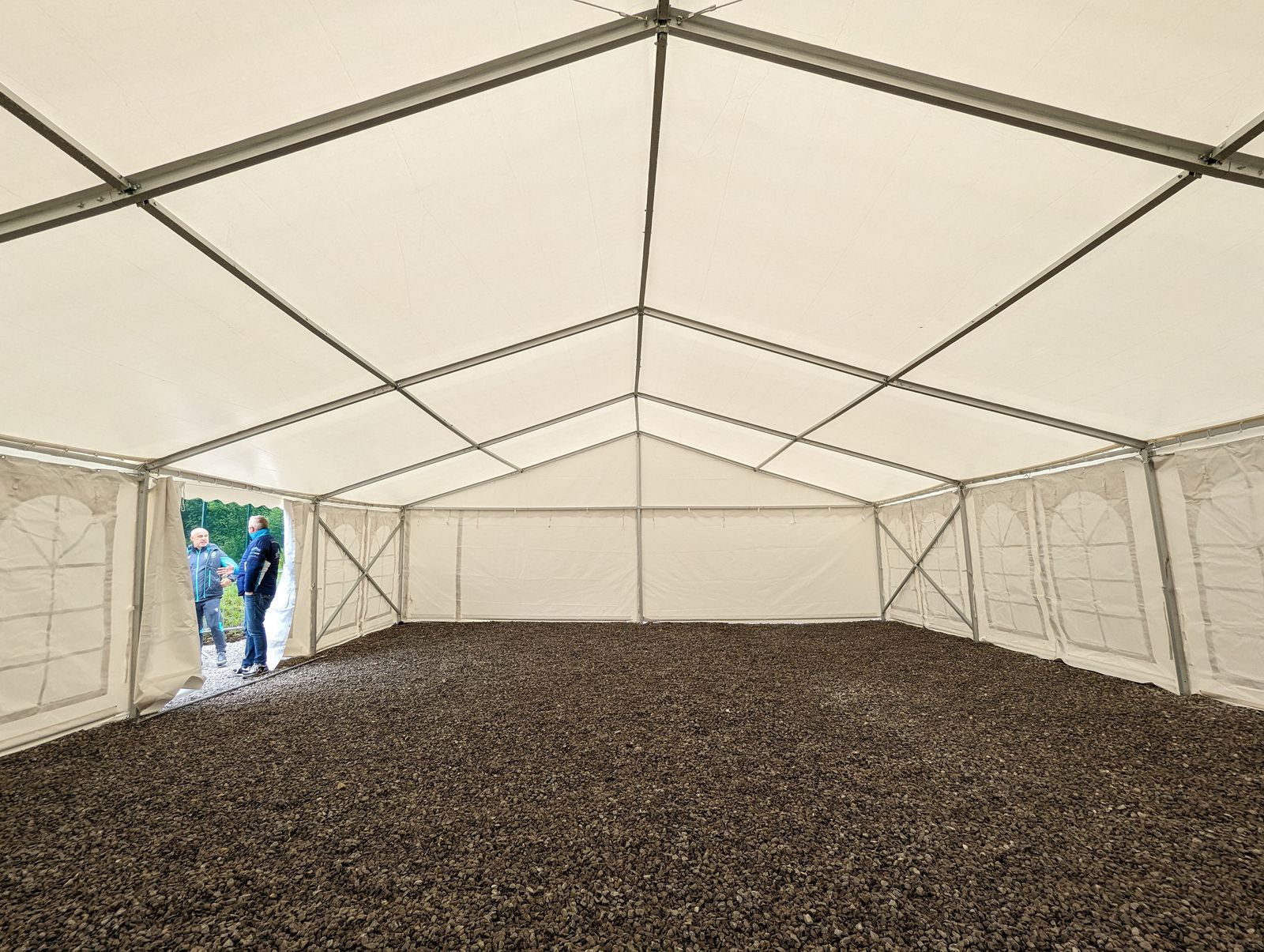 Inside a large, open marquee