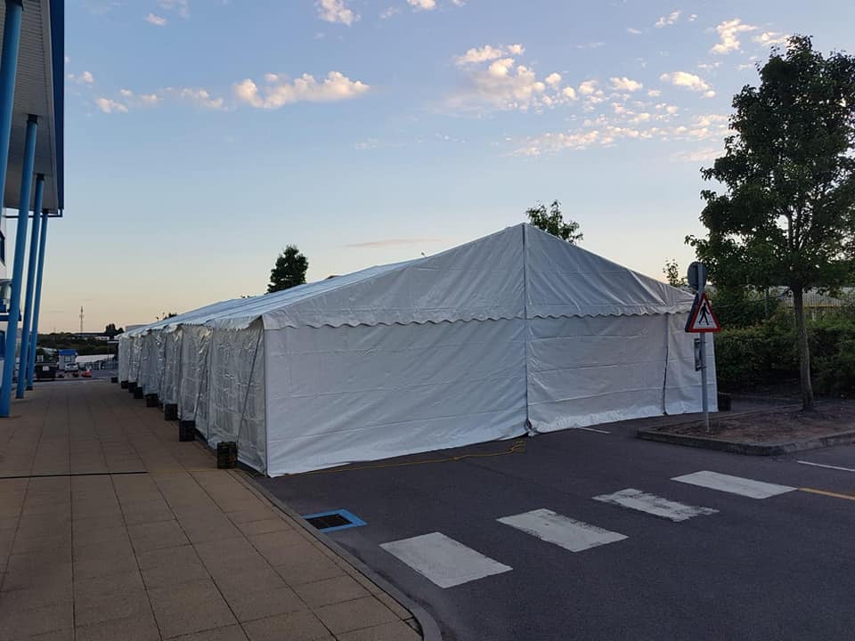 large marquee with lots of weights