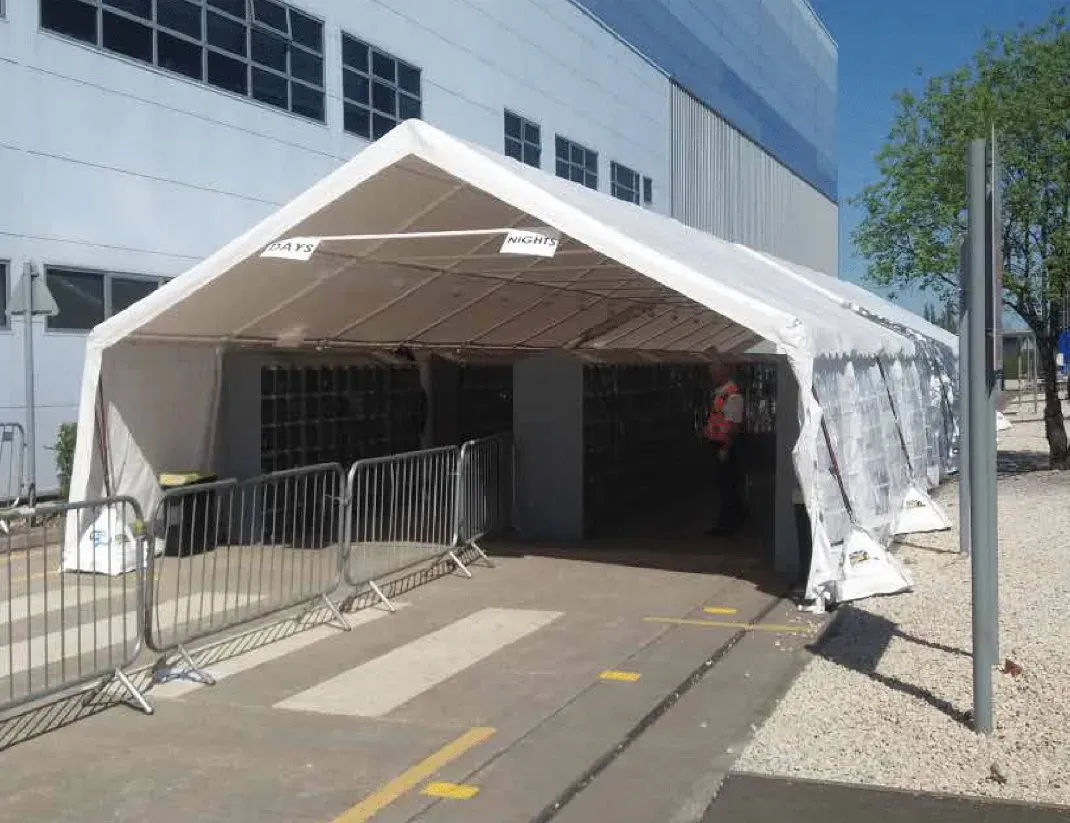 medical team under a green gazebo at an event
