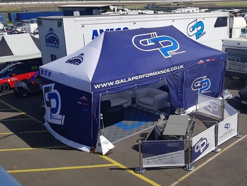 large gazebo in motorsport paddock