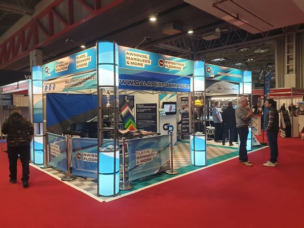 a well presented gazebo and lighting unit at a trade show