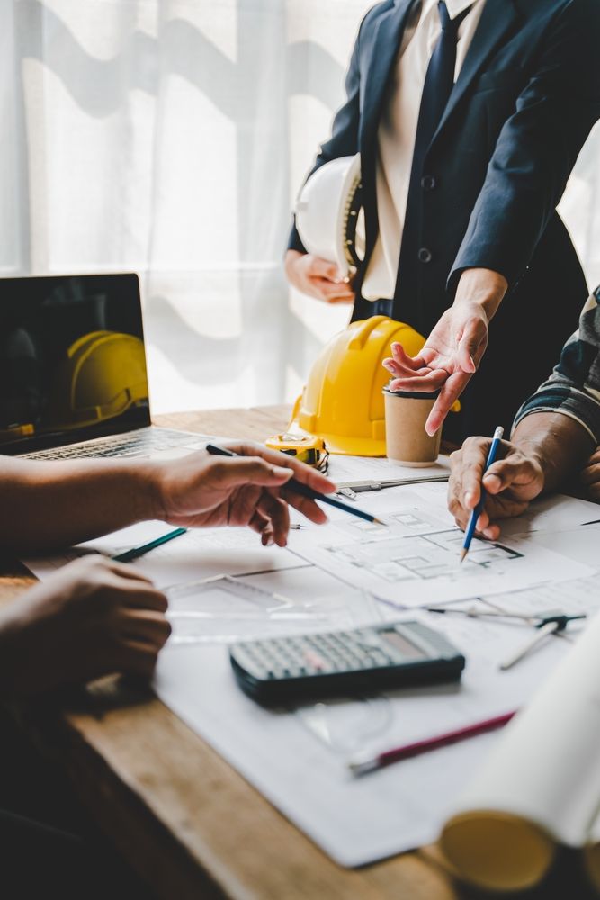 staff at construction firm discuss business