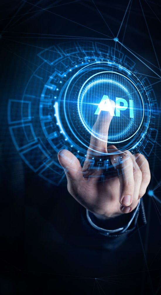 finger presses a virtual button with "API" displayed