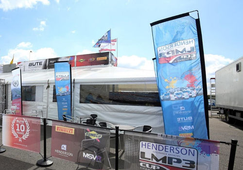 flags and cafe barriers near a hospitality unit