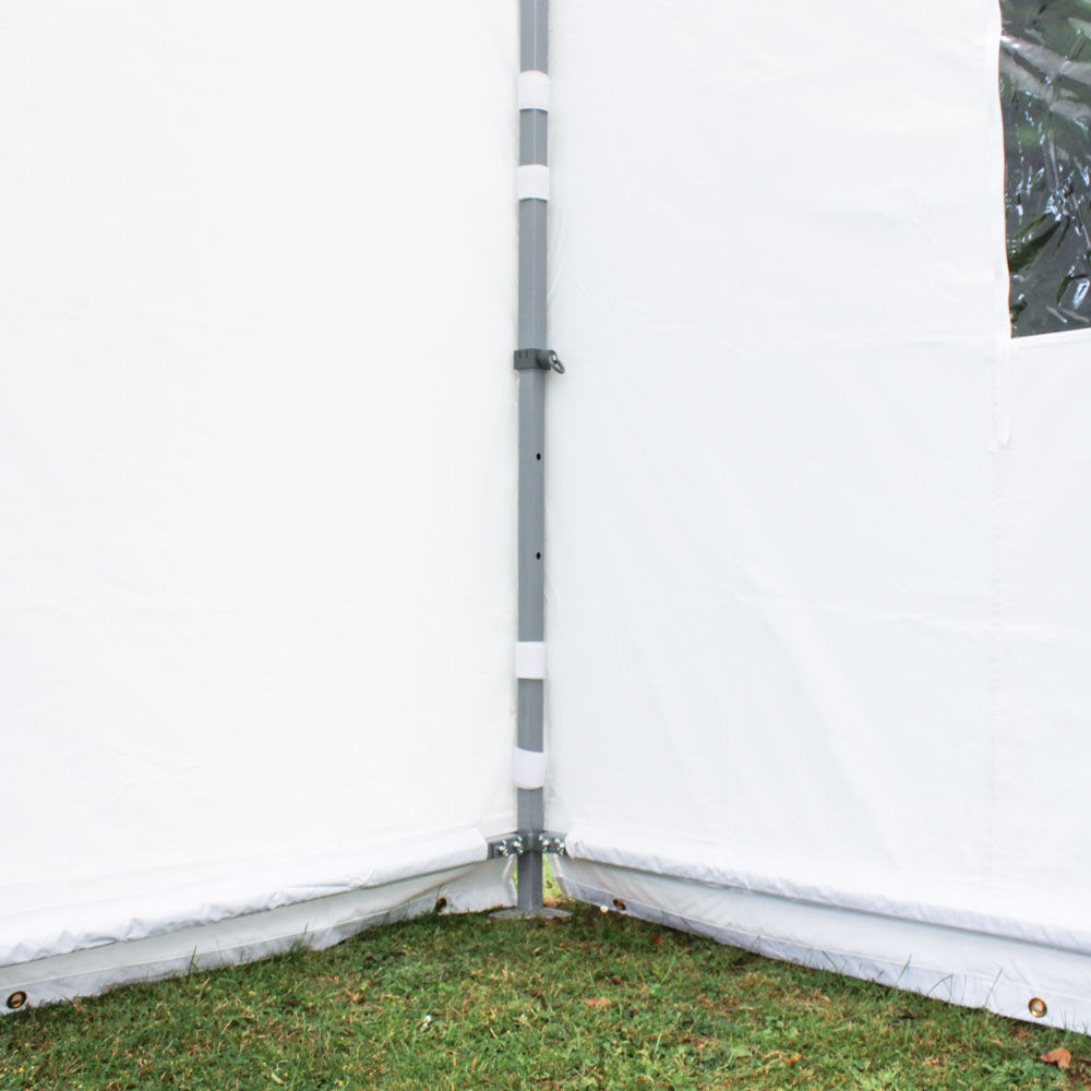 a gazebo sidewall is held taut by ground bars
