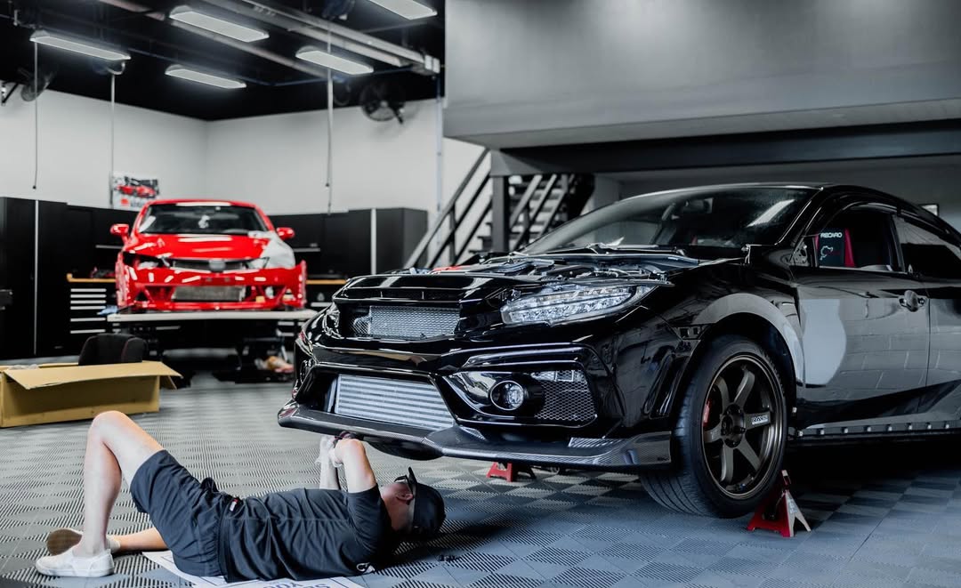 working on cars on swisstrax