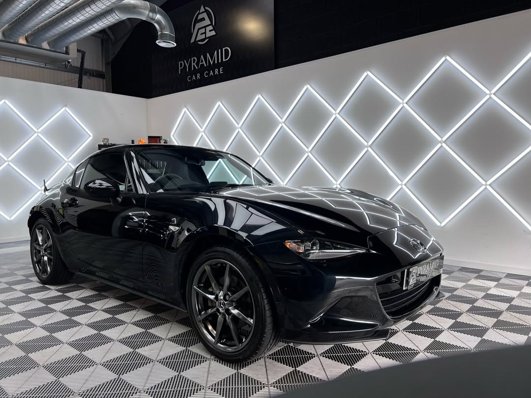 Miata with hexagon lights and swisstrax