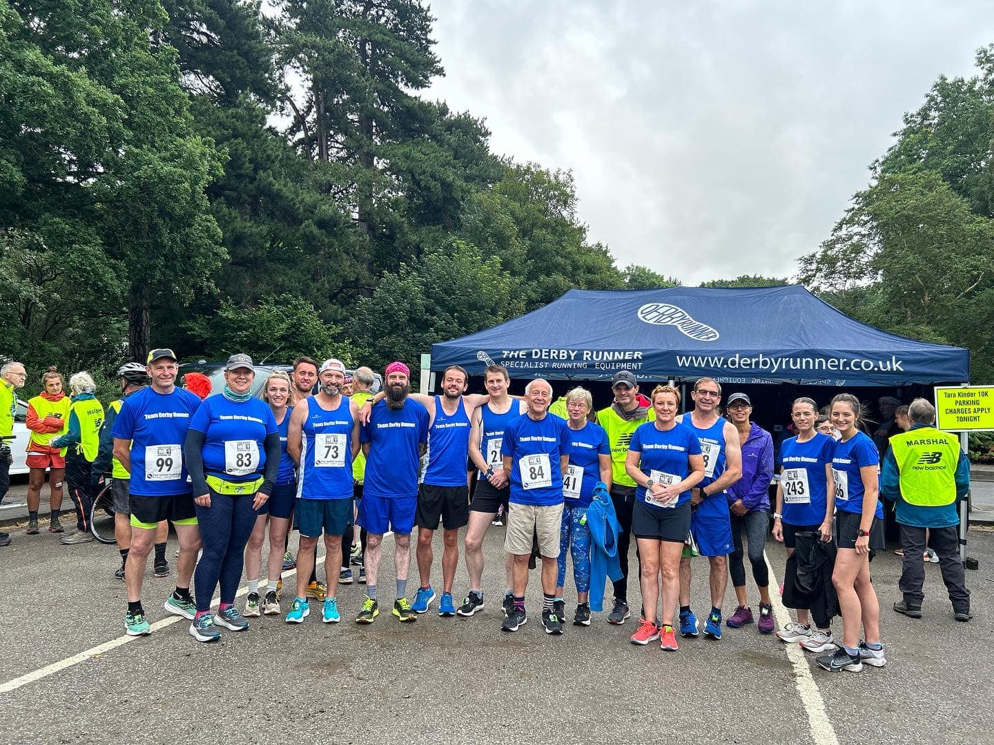 Several runners pose for a photograph
