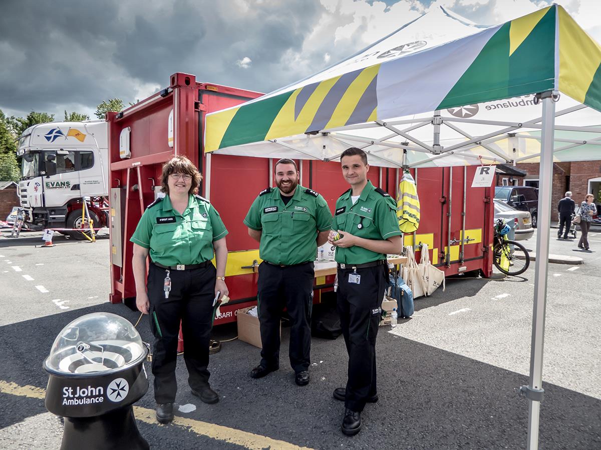 St John's ambulance crew beneath a gazebo