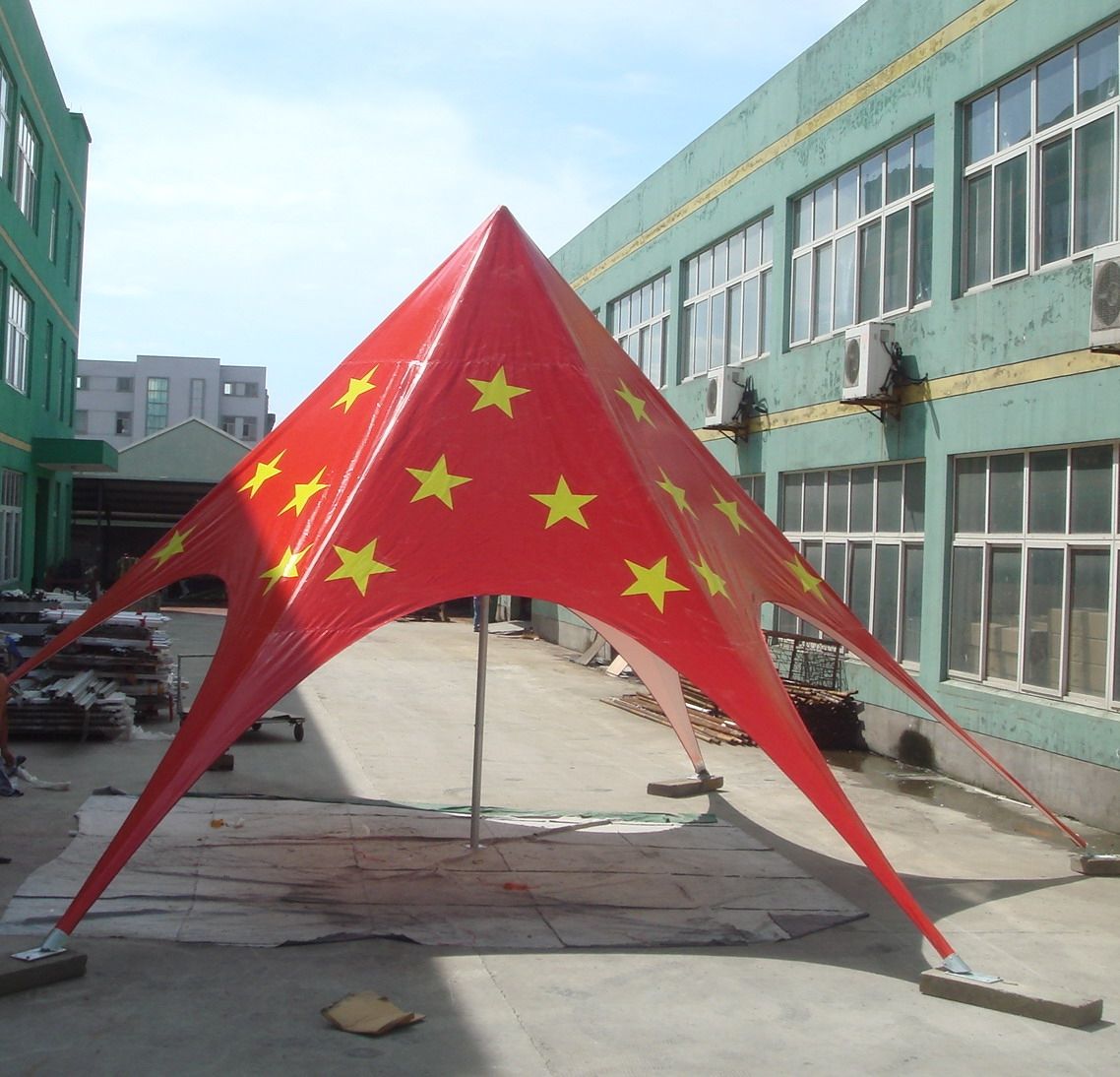 Red star shade marquee with yellow stars