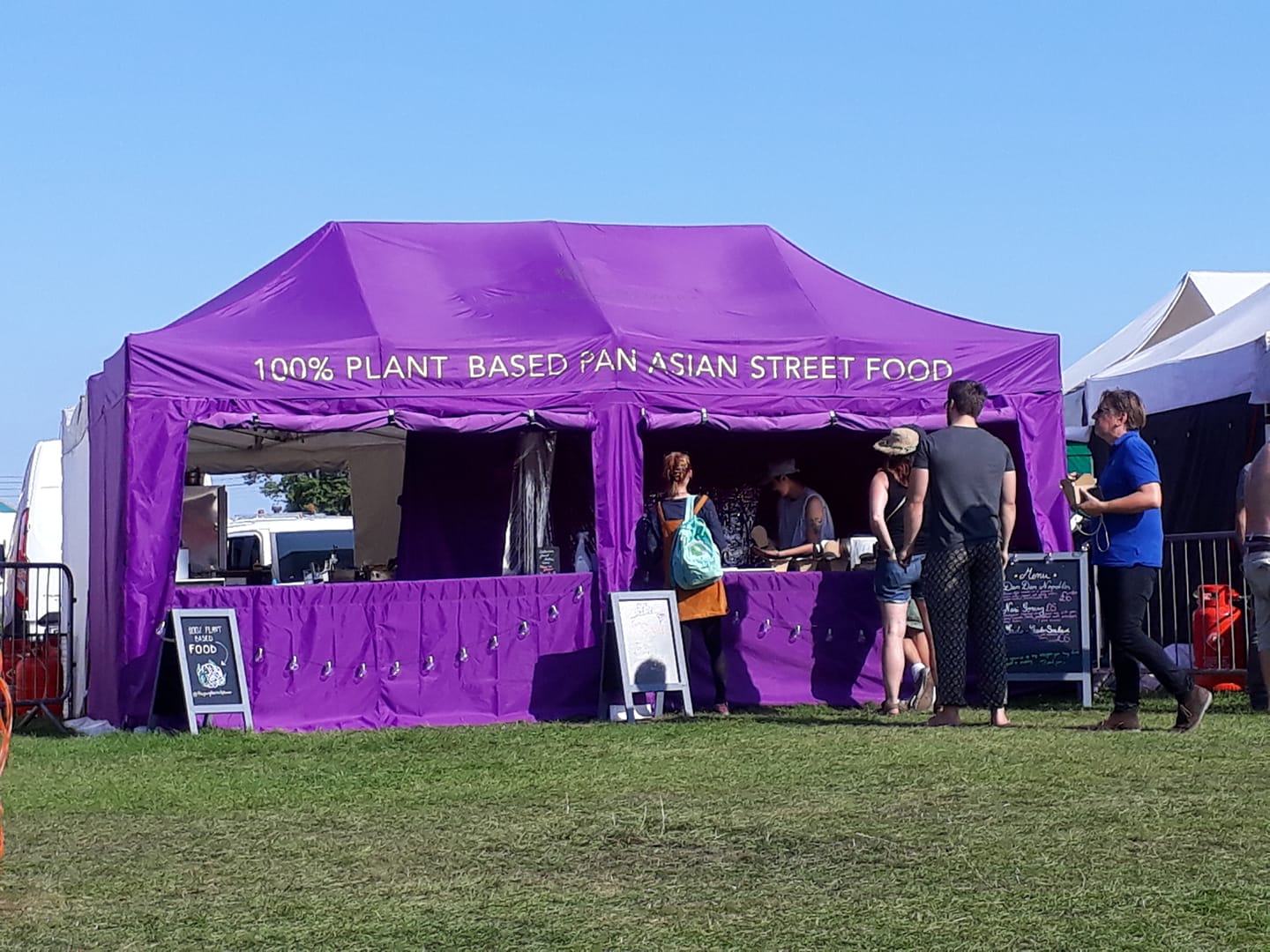 purple gazebo for selling vegan street food