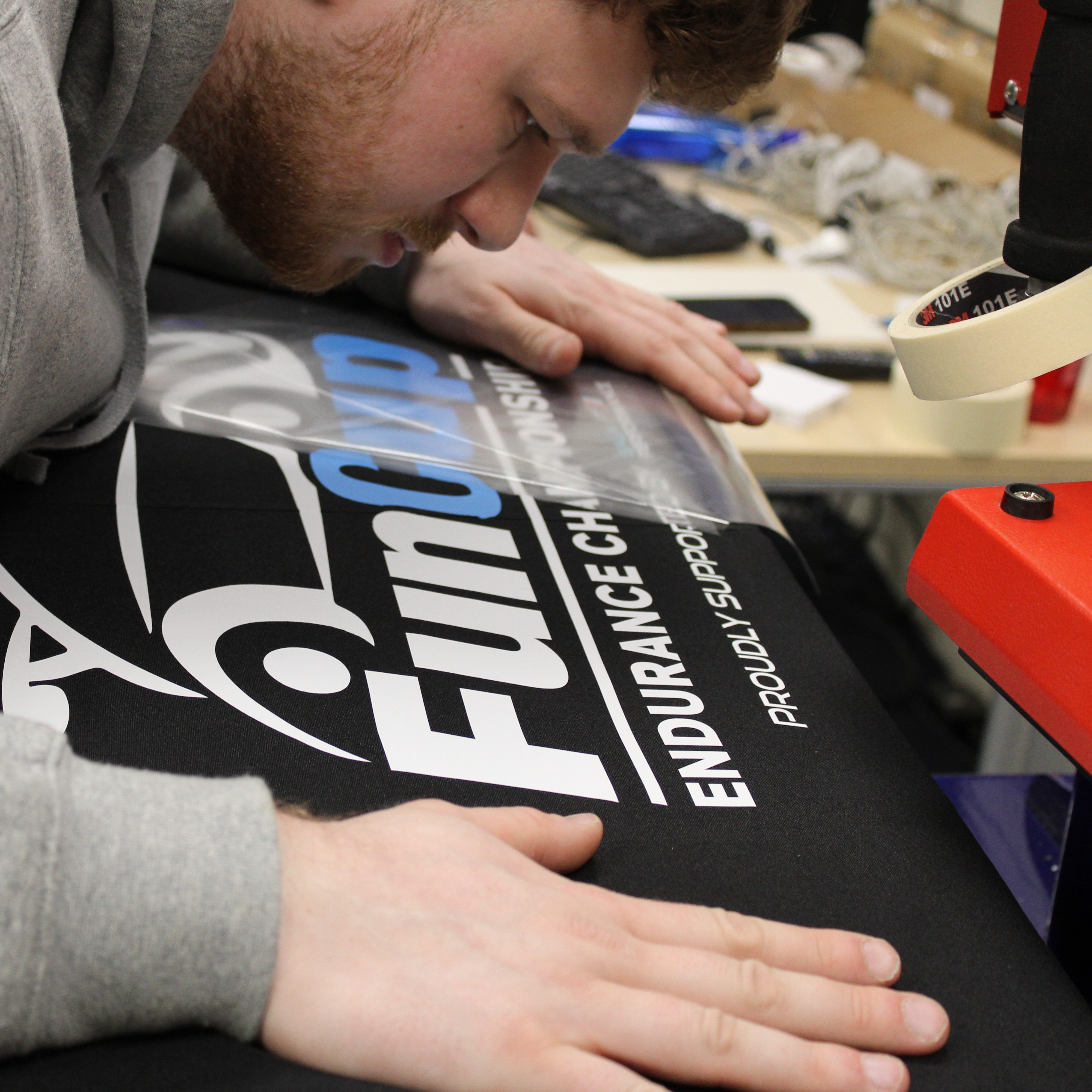 Gala Shade staff pressing a printed gazebo