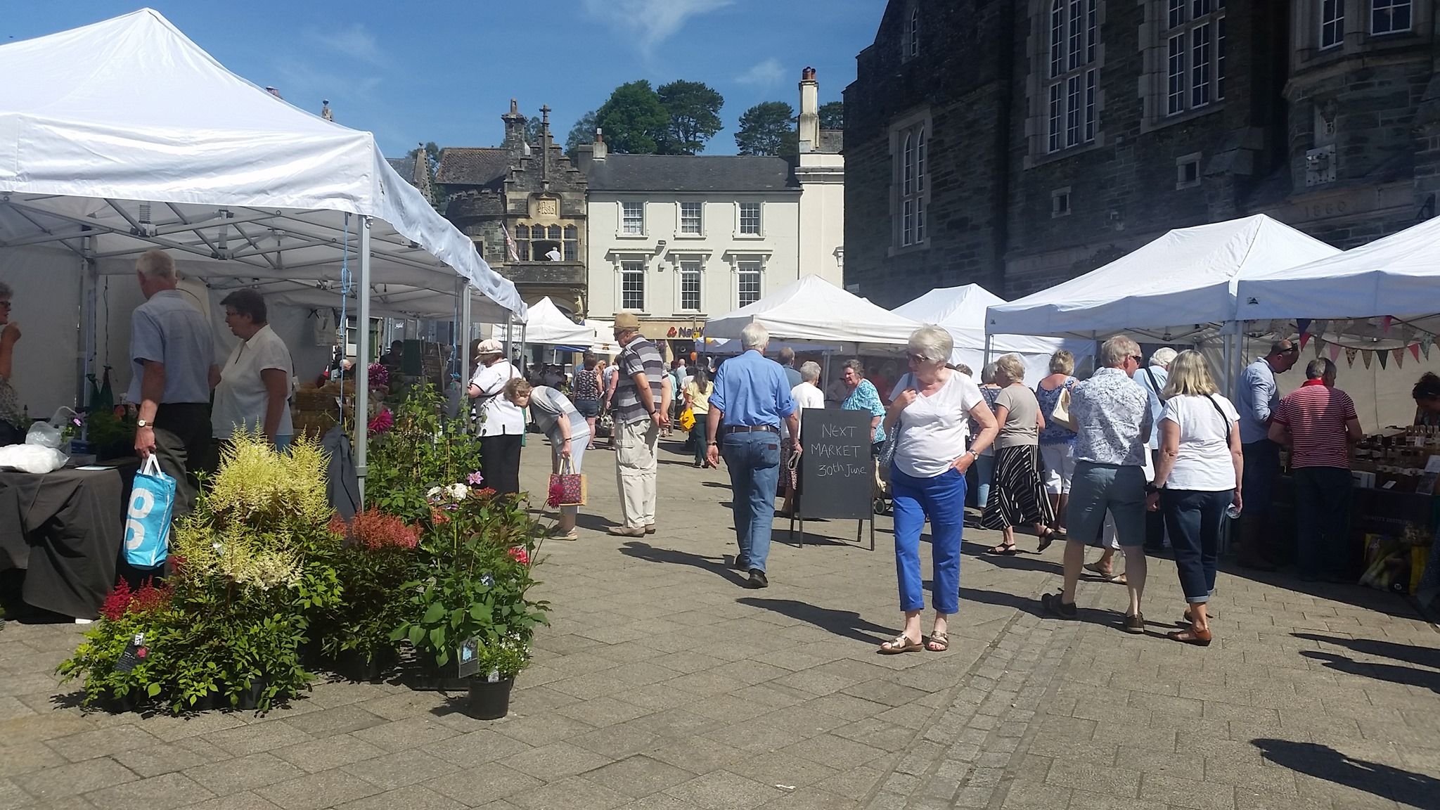 white gazebo market stalls in small town