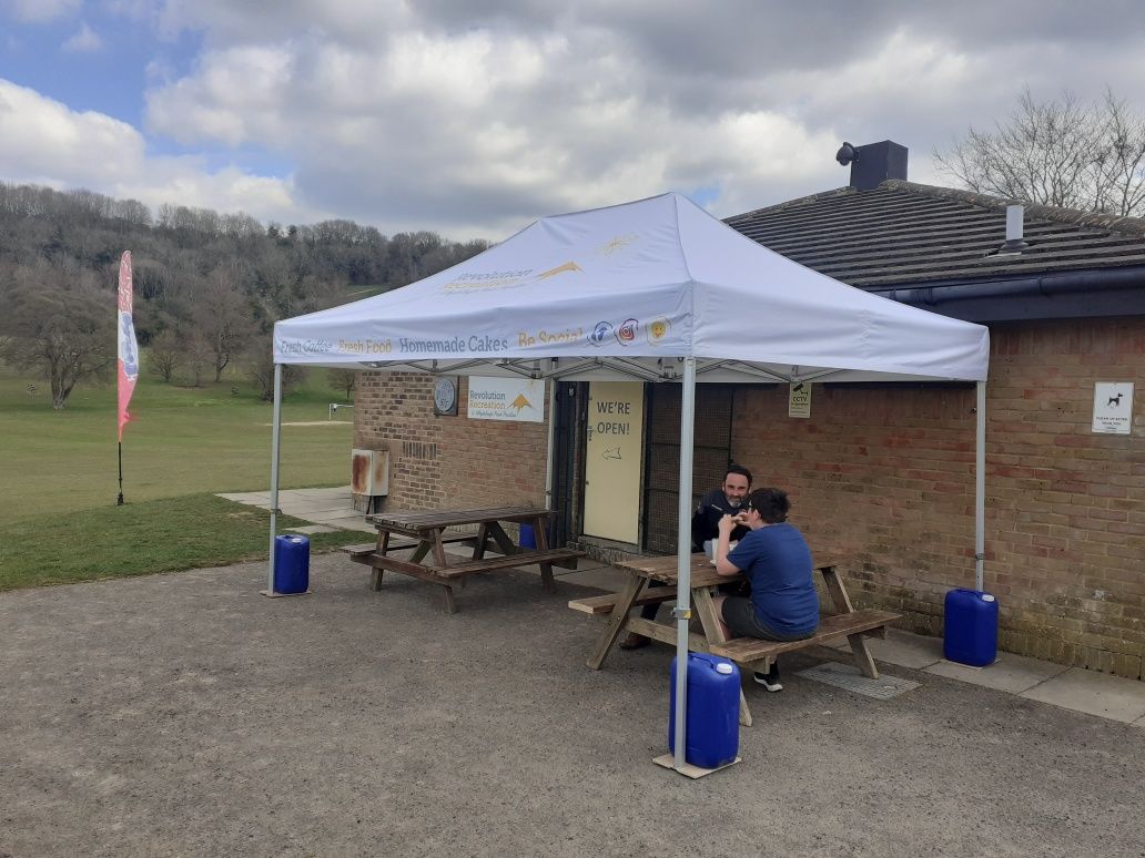 an instant gazebo covers a small picnic area