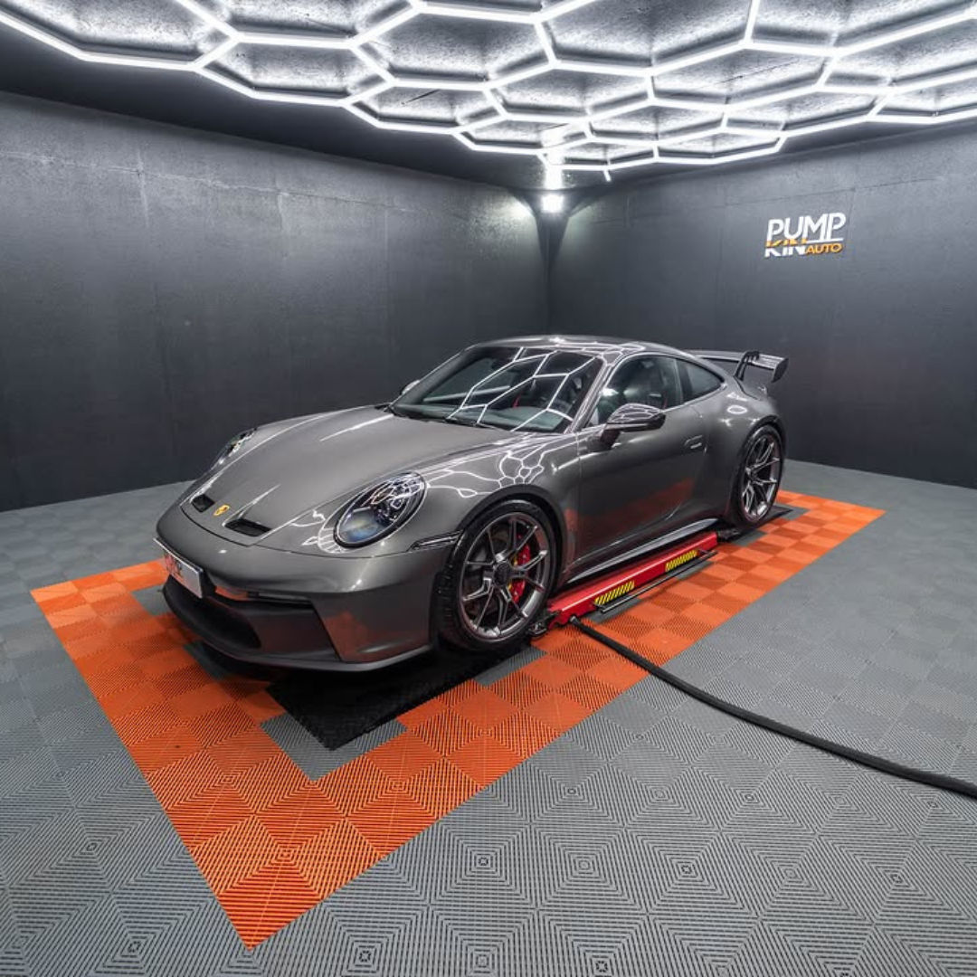 Vehicle studio with lighting on modular tiles