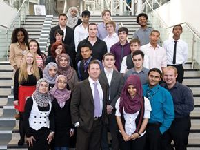 Jason Mace working with a group of learners as part of the Peter Jones academy