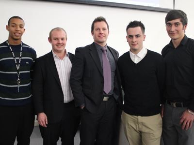 Jason Mace with a group of young entrepreneurs