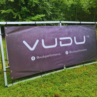 Outdoor frame banner and frame in use at event
